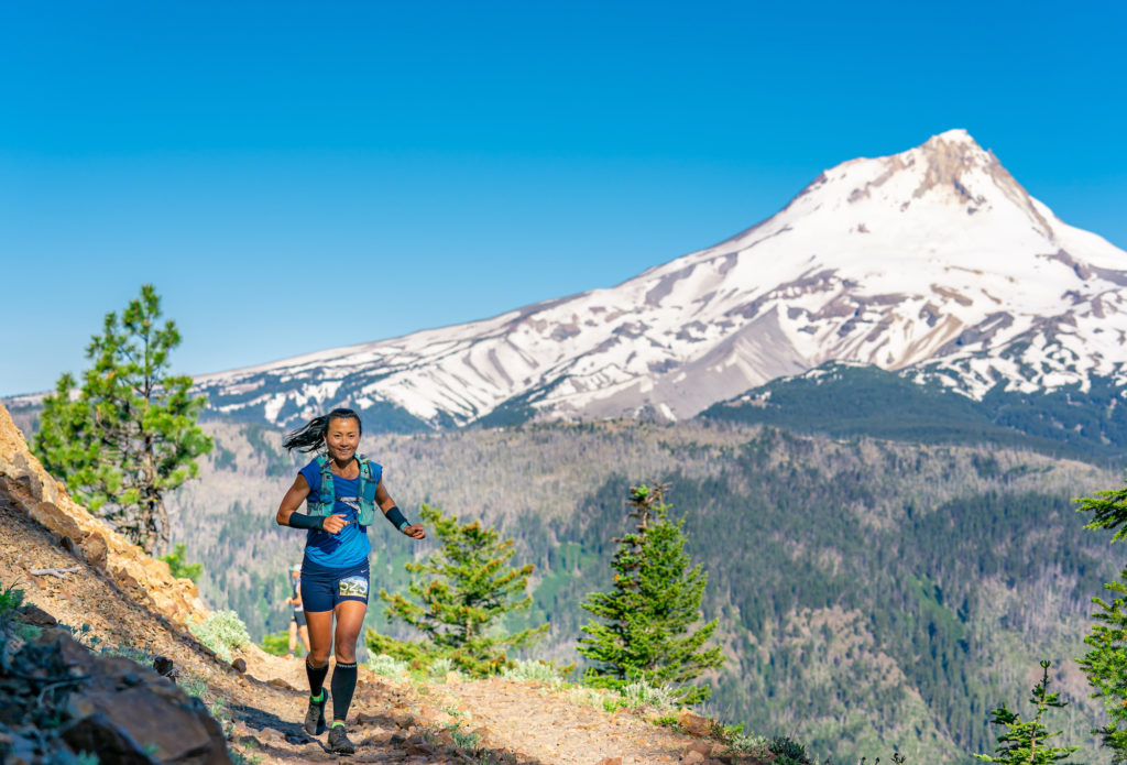 Runner on the Wy'east Wonder course with Mt Hood large in the background